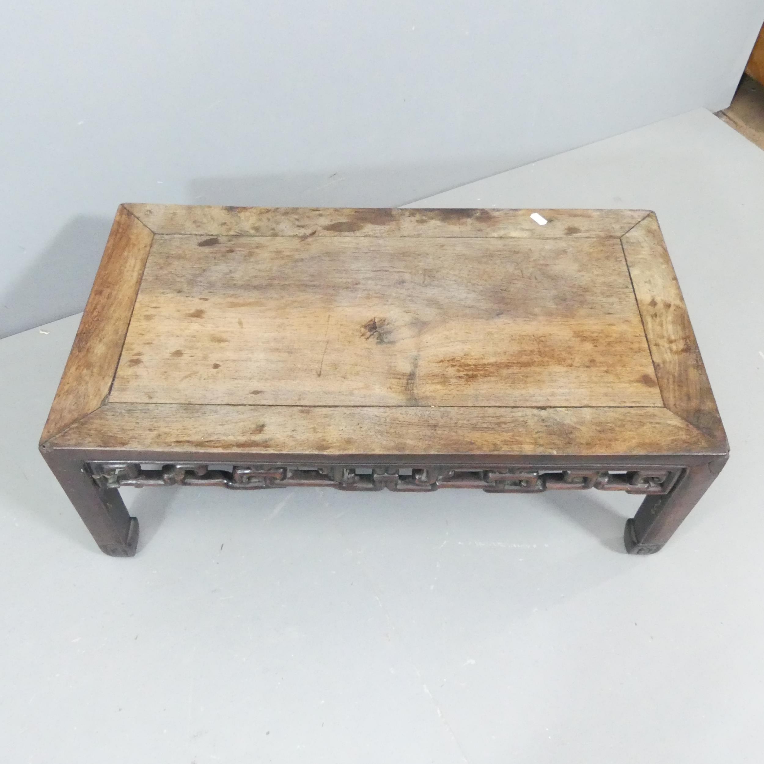 A Chinese hardwood low rectangular coffee table with carved decoration. 77x29x42cm. - Image 2 of 2
