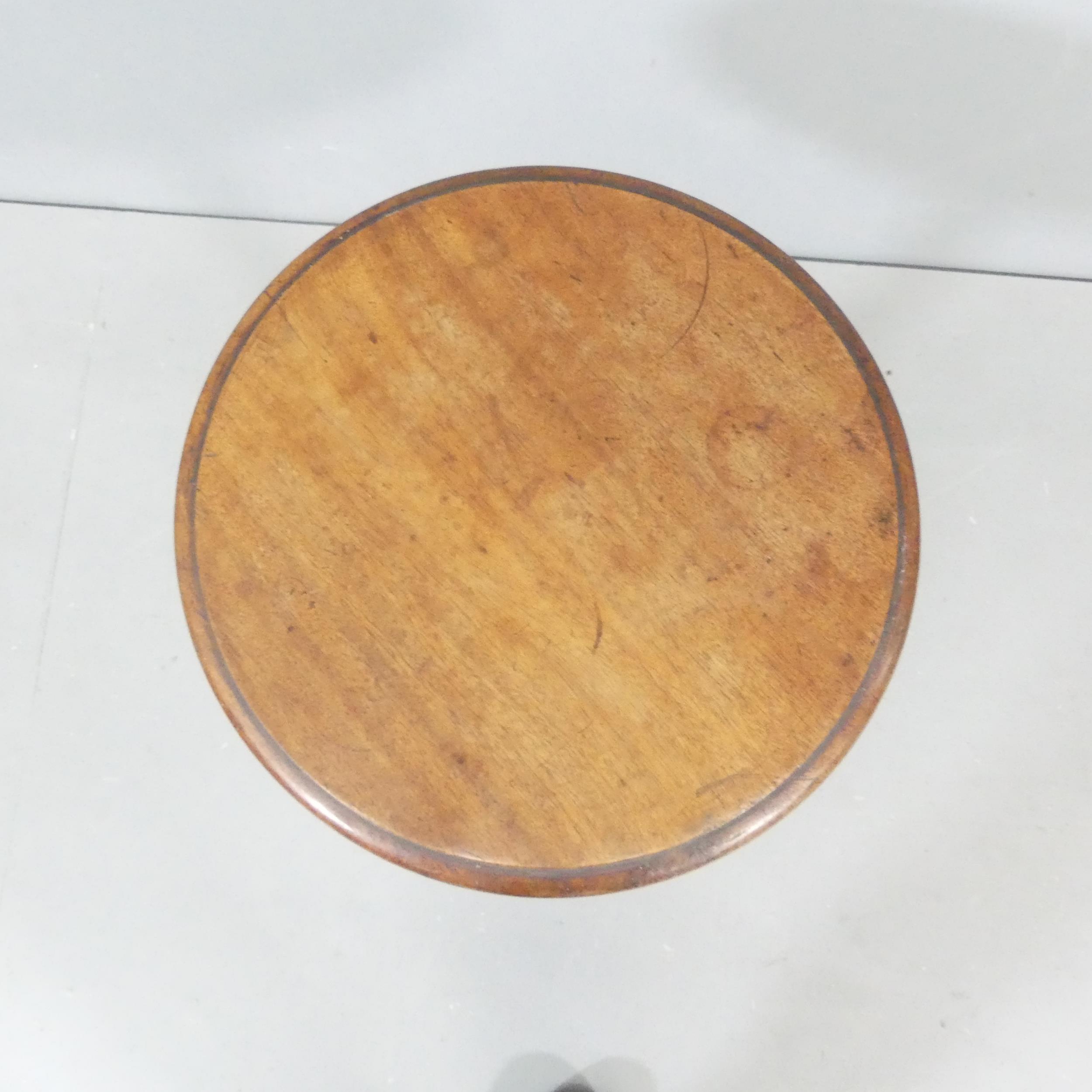 An antique mahogany tilt-top wine table. 40x58cm. - Image 2 of 2