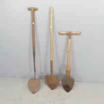 Three antique peat and turf spades.