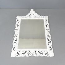 An antique French painted wall mirror, with scrolled acanthus leaf surround. 90x136cm. Pediment is