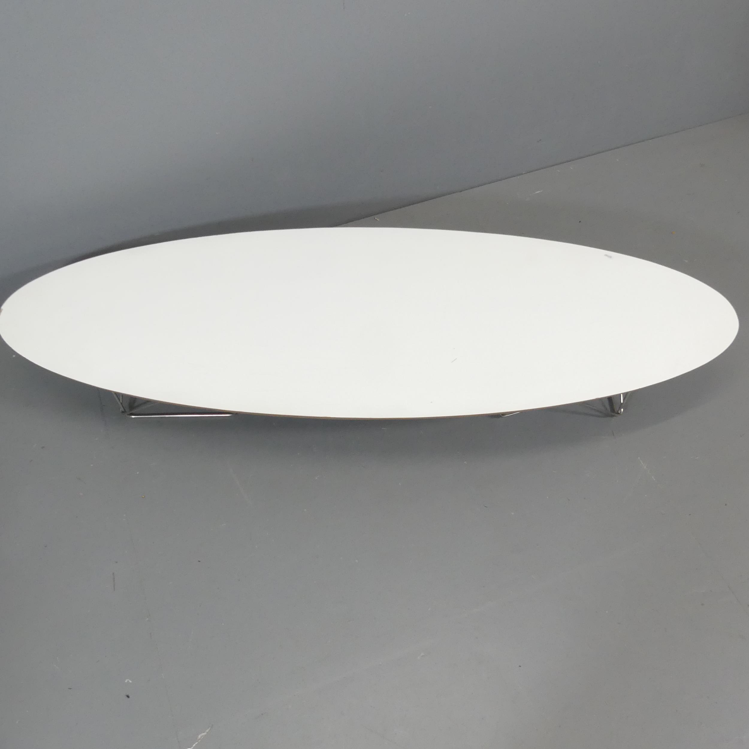 An elliptical surfboard coffee table in the manner of Charles and Ray Eames. 179x26x58cm. - Image 2 of 3