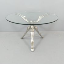 A contemporary designer cast aluminium and glass coffee table, the base with conjoined