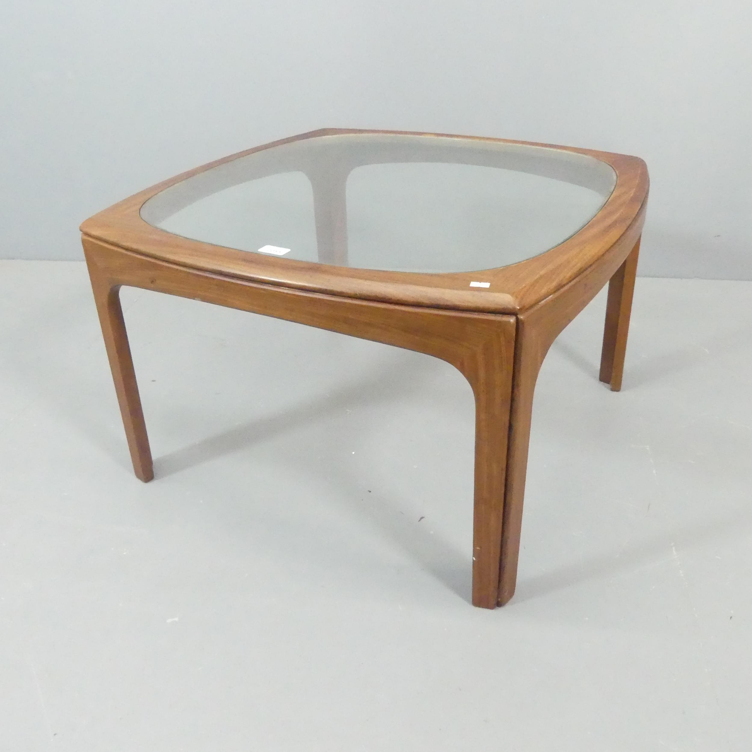 G PLAN - A vintage Frescoe range coffee table with inset glass top. 76x46cm.