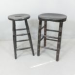 Two painted elm-seated stools. Tallest 69cm.
