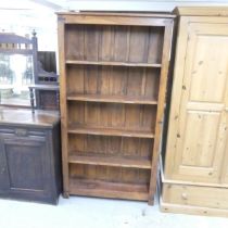 A modern sheesham bookcase with 5 fixed shelves. 100x187x28cm.