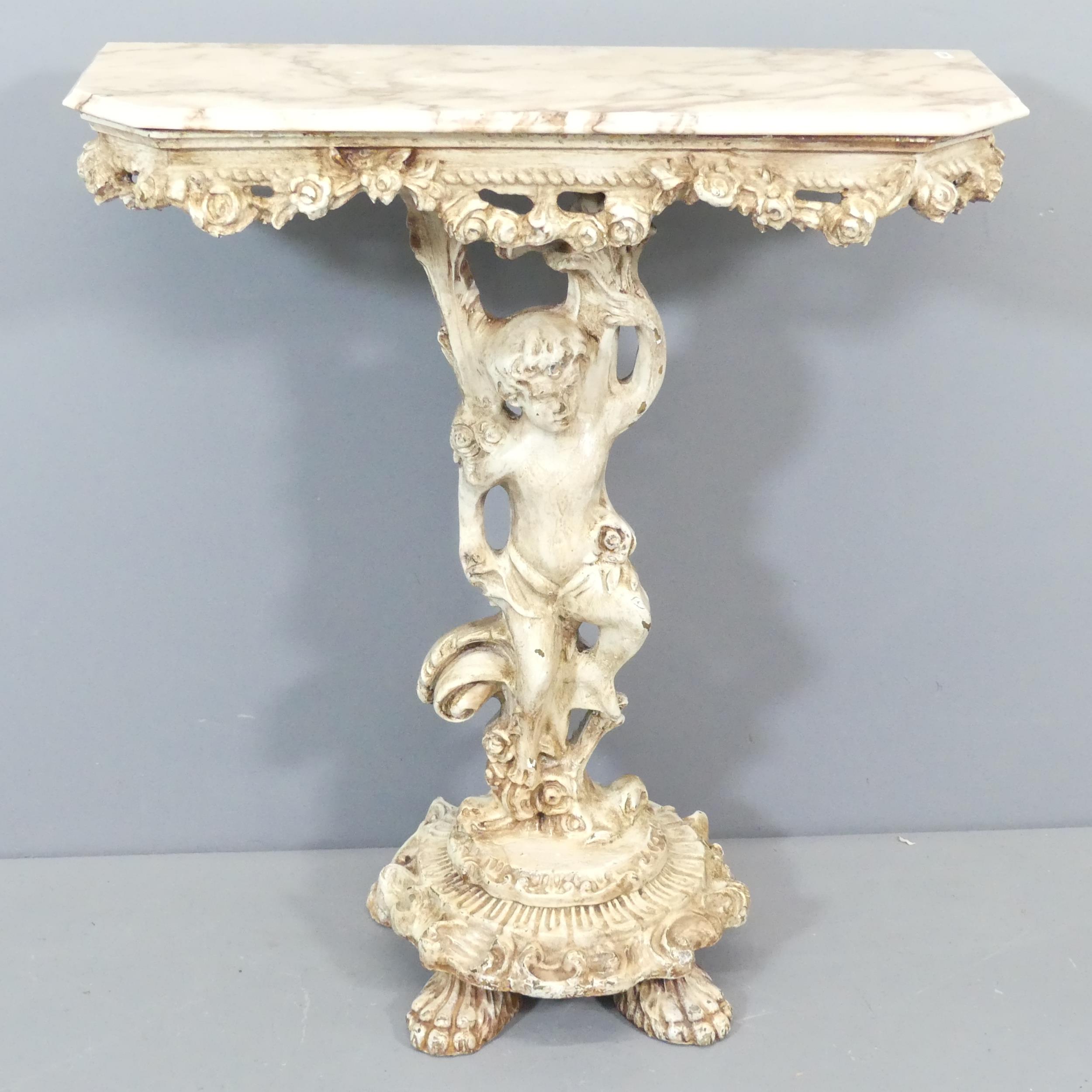 A continental marble-topped console table, on painted wooden cherub base with carved and painted