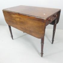 A 19th century mahogany drop-leaf Pembroke table, with end frieze drawer. 89x70x46cm.