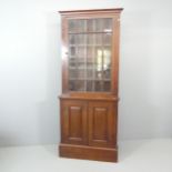 A 19th century mahogany library bookcase, in single section, with lattice glazed door and