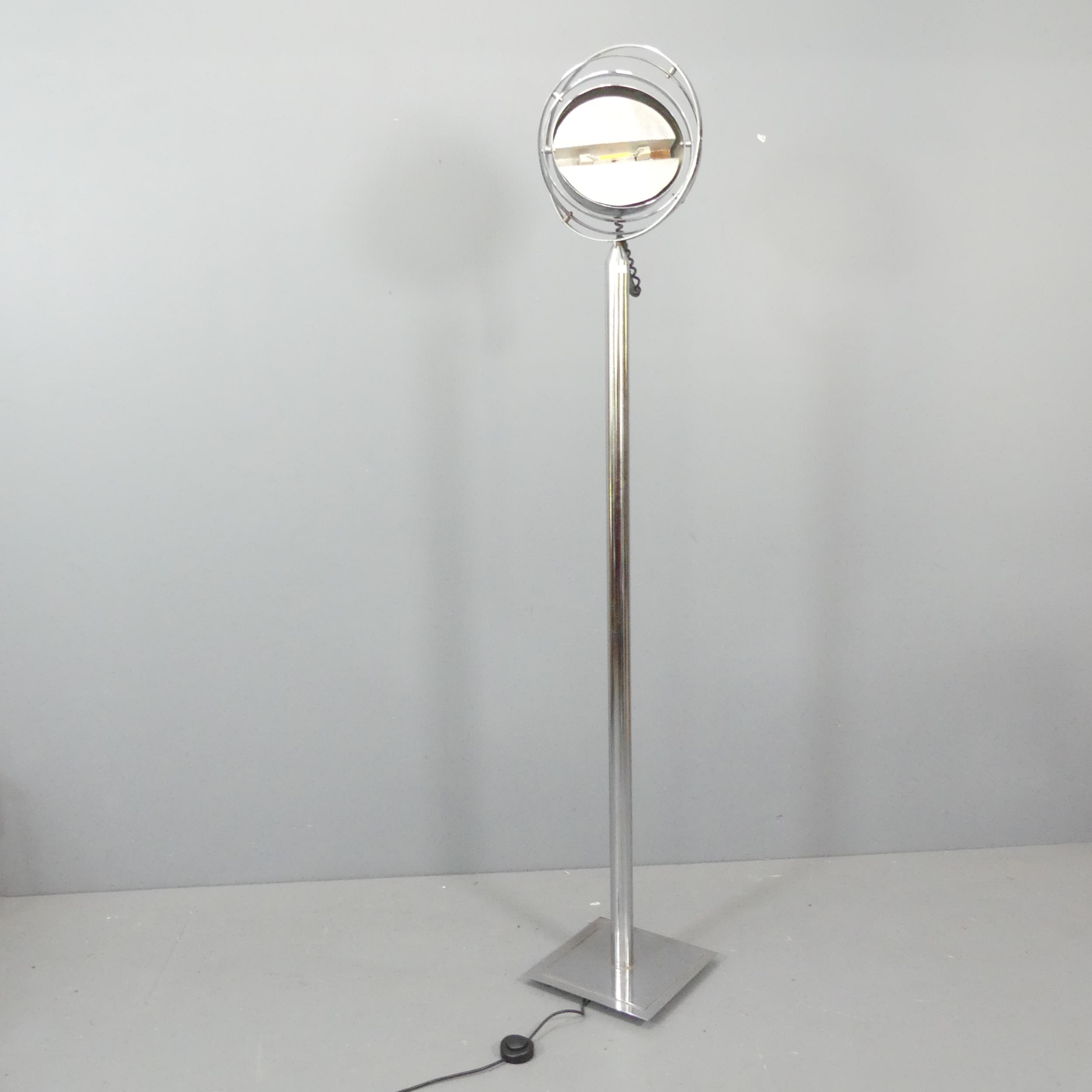 An Art Deco design adjustable globe floor standing lamp in the manner of Jean Damon. H - 190cm.