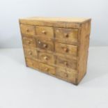 A Victorian pine bank of 12 drawers. 80x66x30cm.