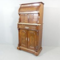 A Victorian burr walnut two-section dentist's cabinet, the top section having a cylinder top