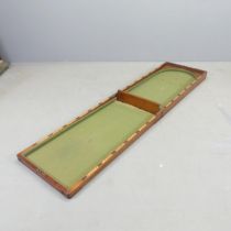 A vintage oak folding Bagatelle board. 46x12x91cm (folded).