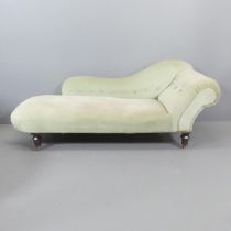 A Victorian mahogany and upholstered chaise longue. 180x70x66cm.