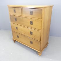 A Victorian mahogany chest of two short and three long drawers, with brass campaign style handles.