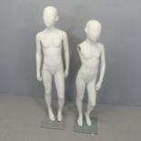 Two modern shop display mannequins, one lacking an arm. Tallest 141cm.