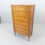 A French cherry wood semanier chest of 7 drawers. 61x112x35cm.