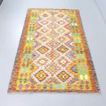 A Chobi Kilim rug. 200x124cm.