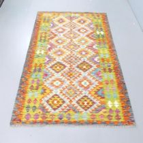 A Chobi Kilim rug. 200x124cm.