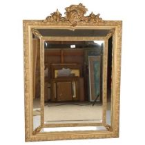 A Venetian style gilt-gesso framed wall mirror, with bevel panels, dimensions excluding pediment
