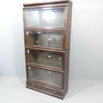 GLOBE WERNICKE - an early 20th century oak four-shelf sectional stacking bookcase, in six parts