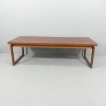 A mid-century modern Scandinavian design teak and rosewood-veneered coffee table, indistinctly