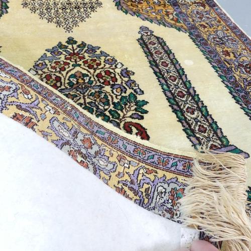A silk cream-ground Persian prayer mat. 125x80cm. - Image 2 of 2