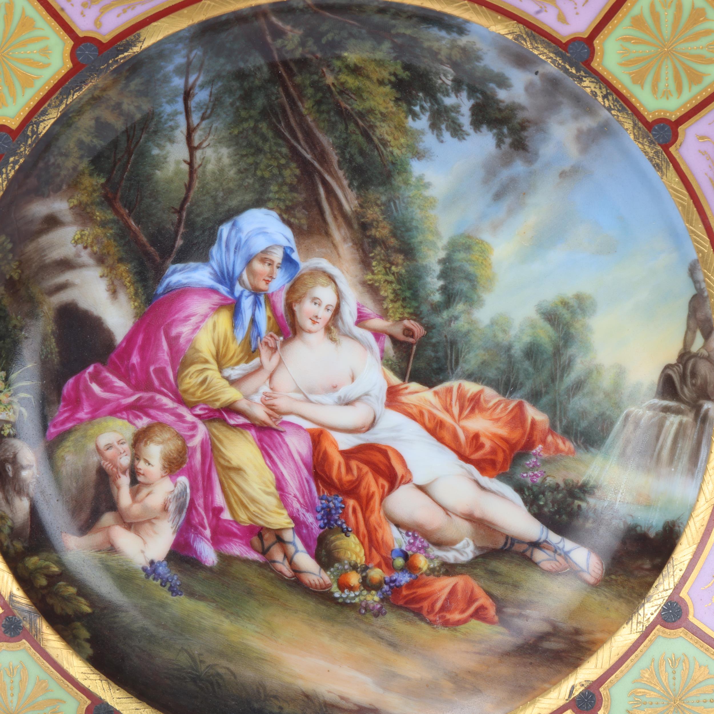 A Vienna porcelain plate depicting Venus and Armida, gilded border, diameter 24.5cm Very good - Image 2 of 3