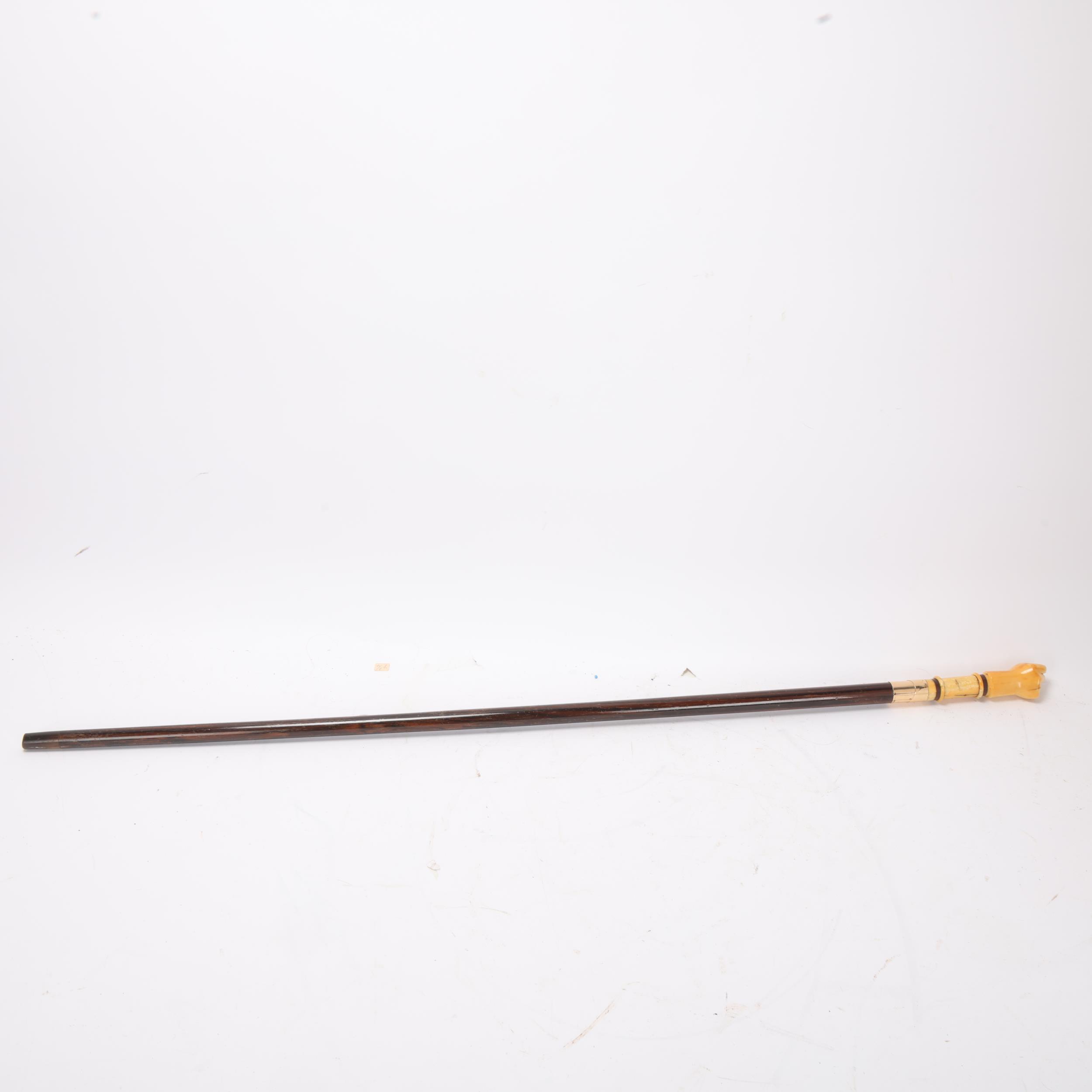 A 19th century marine ivory-handled Naval stick, the handle in the form of a clenched fist, unmarked - Image 3 of 3