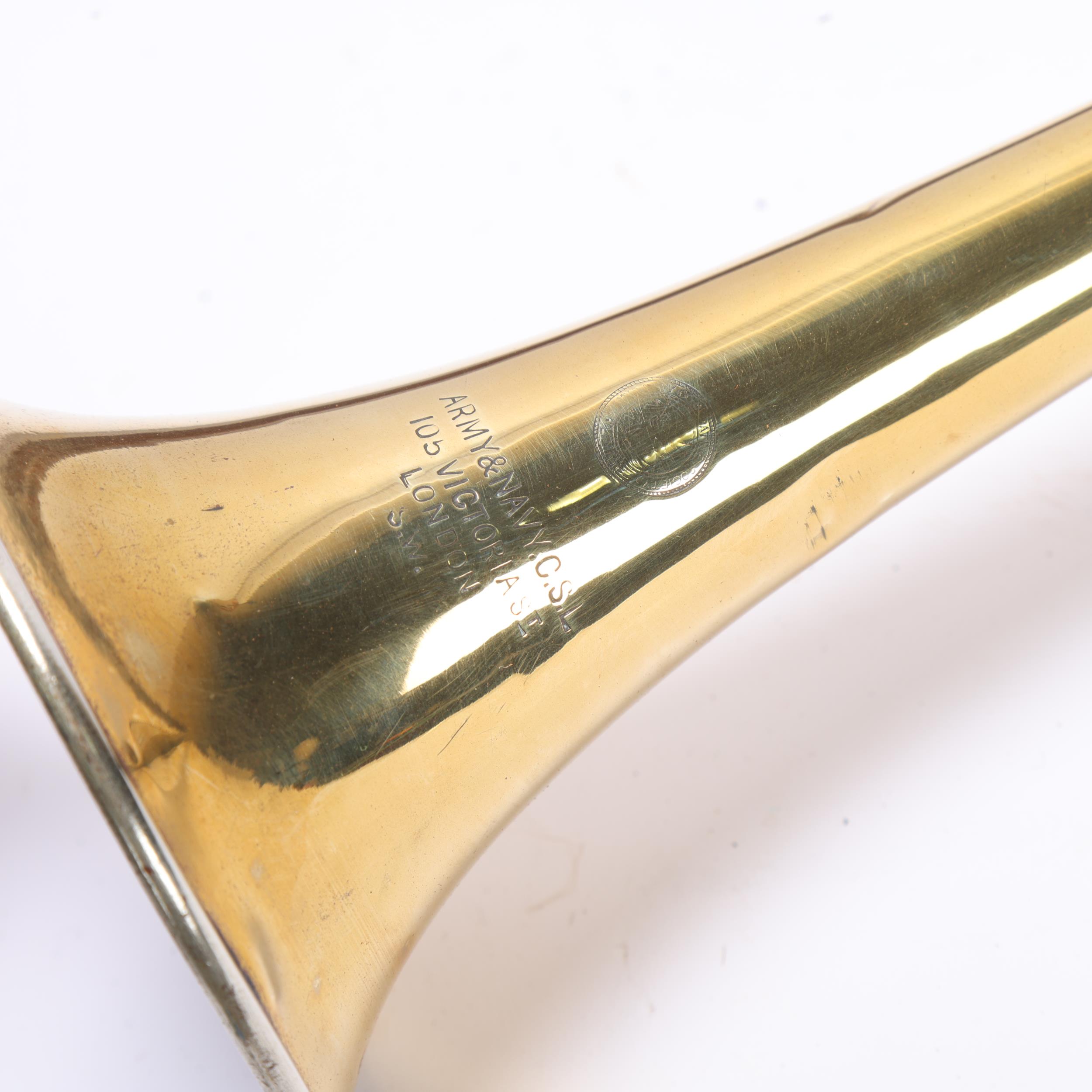 A brass coaching horn, by Army & Navy of London, length 145cm, in leather holder Several very - Image 2 of 3