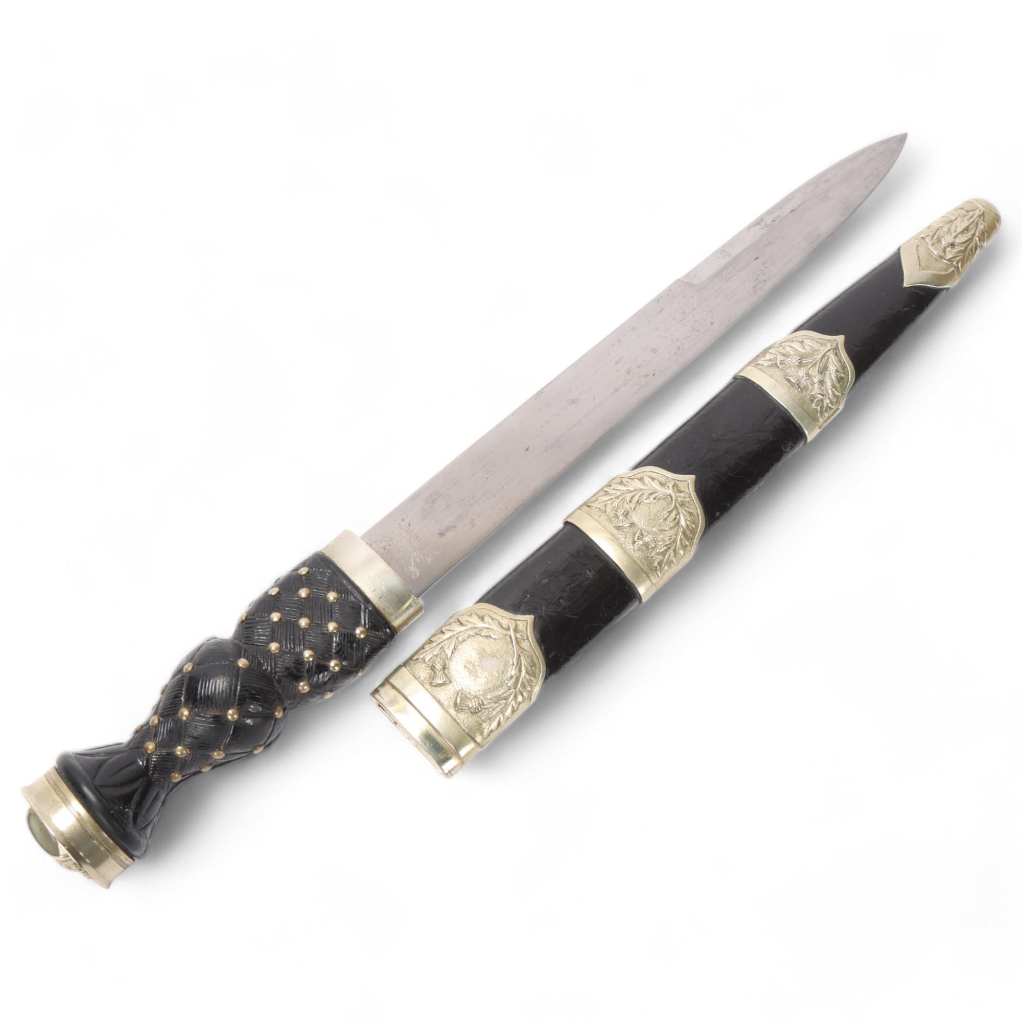 Scottish dagger, early 20th century, with carved wood handle and nickel plate mounts, blade by