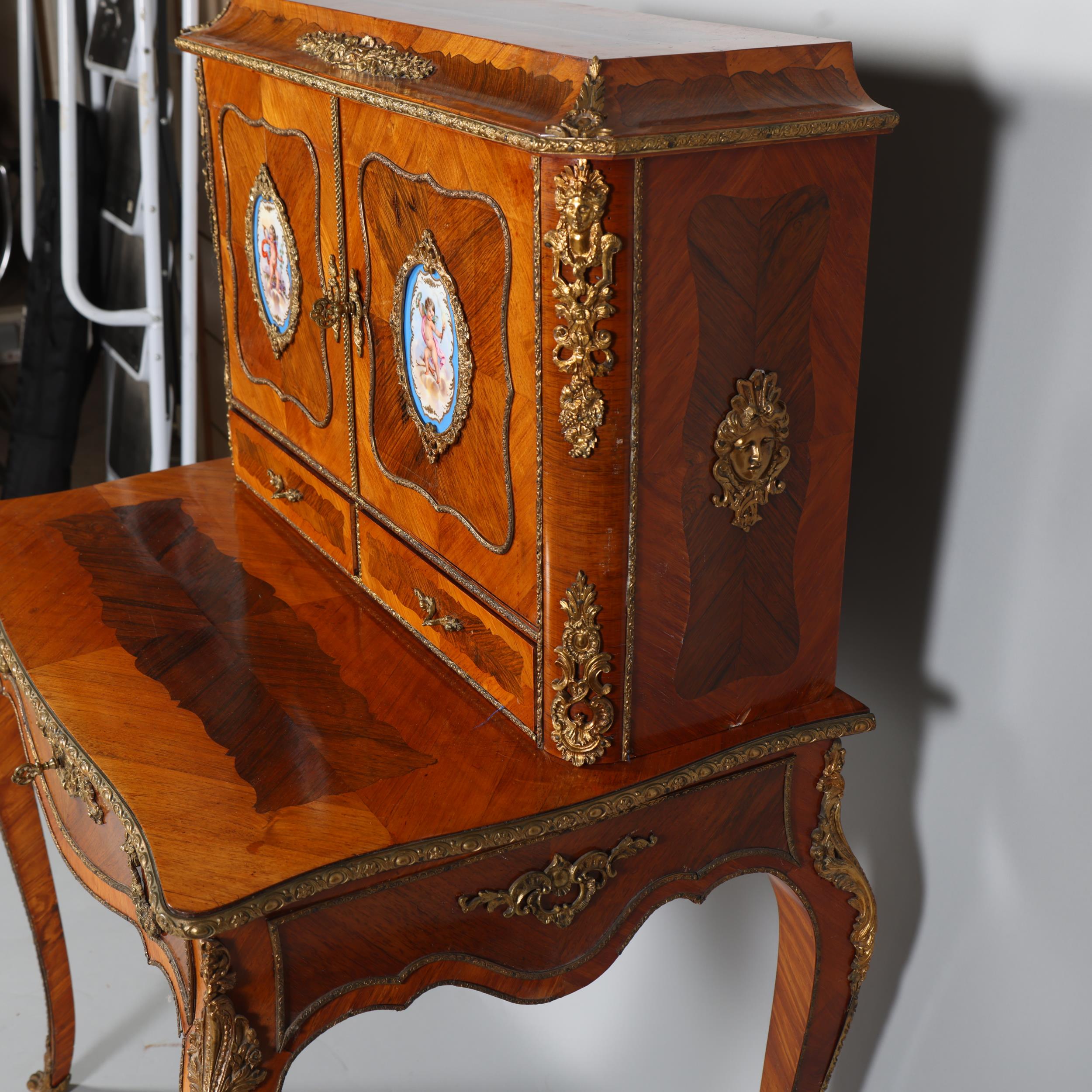 An ornate French kingwood and rosewood writing desk, circa 1900, the upper part fitted with 2 - Image 5 of 9