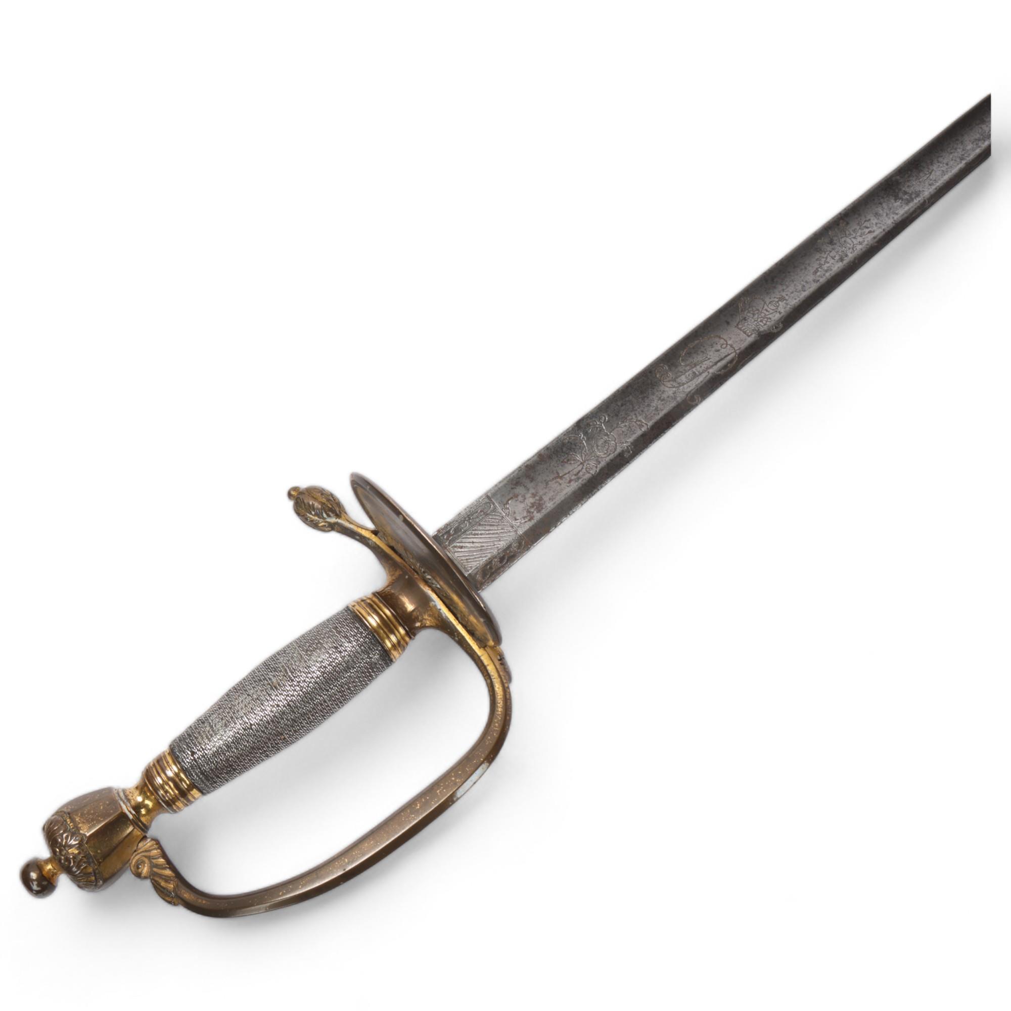 A Georgian sword with silver-bound gilt-brass hilt, folding guard and engraved blade with GR cipher,
