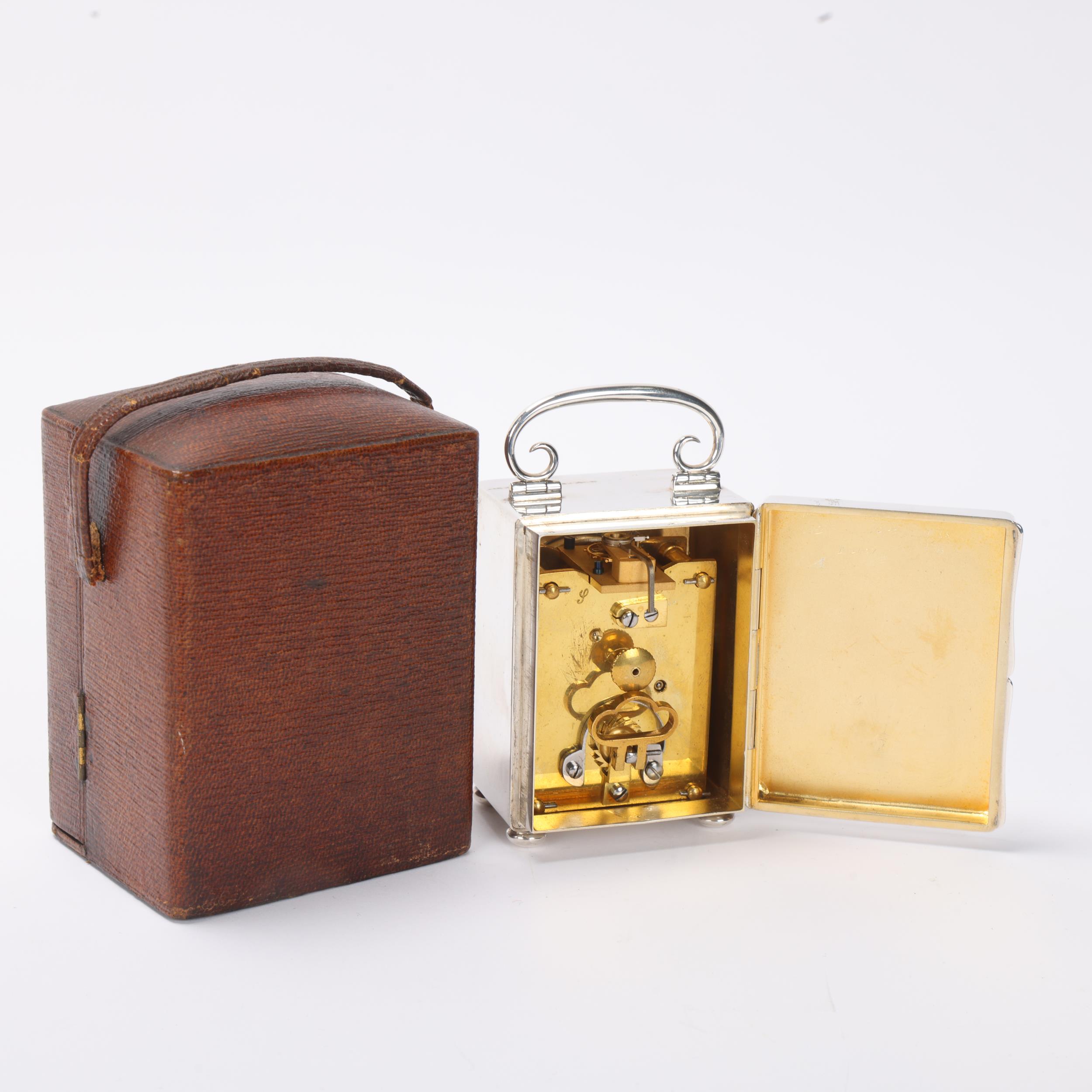 Late Victorian silver carriage clock, enamel dial with glass front and scrolled swing handle, by - Image 3 of 3