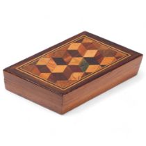 Tunbridge Ware rhomboid-shaped box with cube mosaic lid, labelled "Tunbridge Wells Manufacturing
