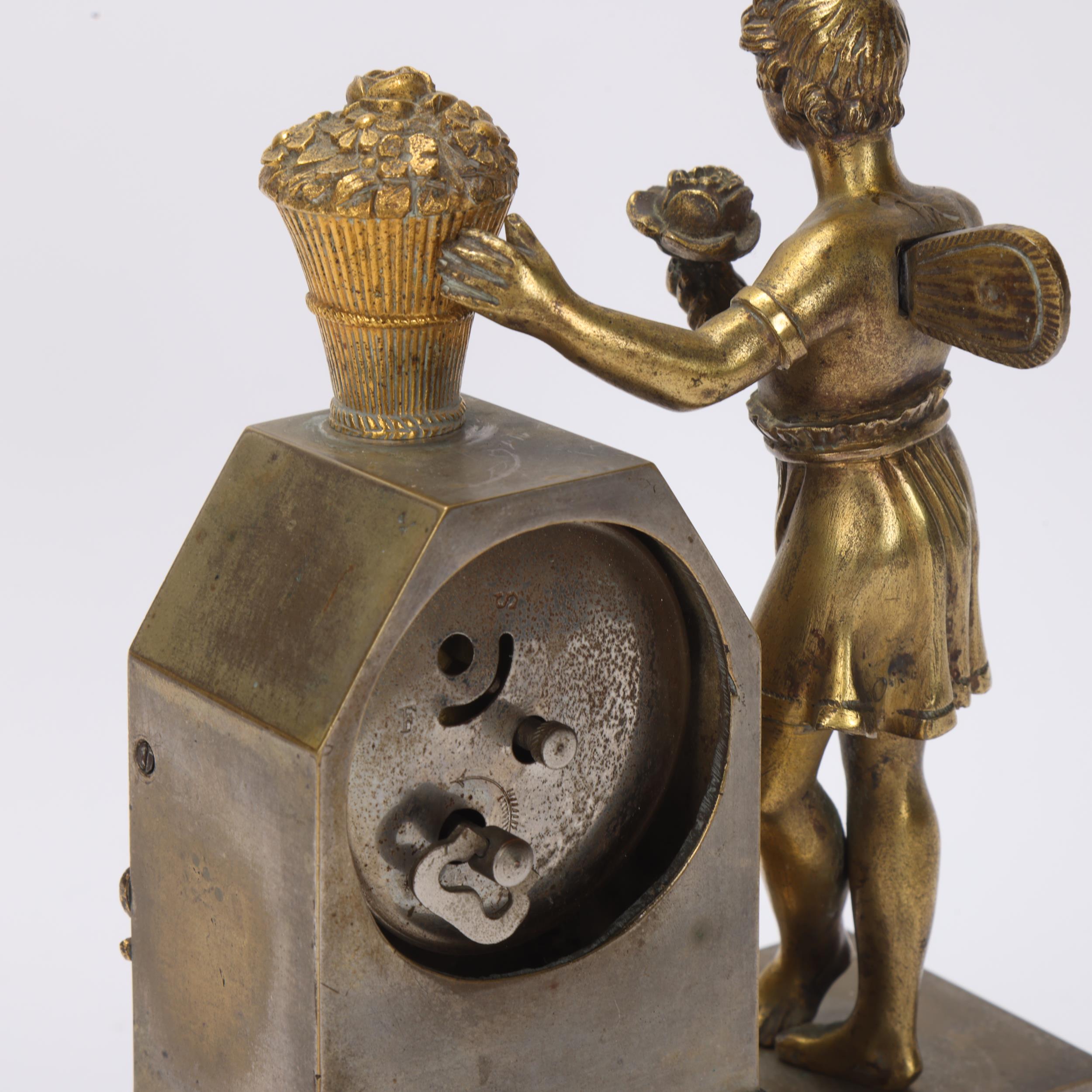 A French parcel-gilt bronze mounted 8-day mantel clock surmounted by an angel figure, spring - Image 3 of 3