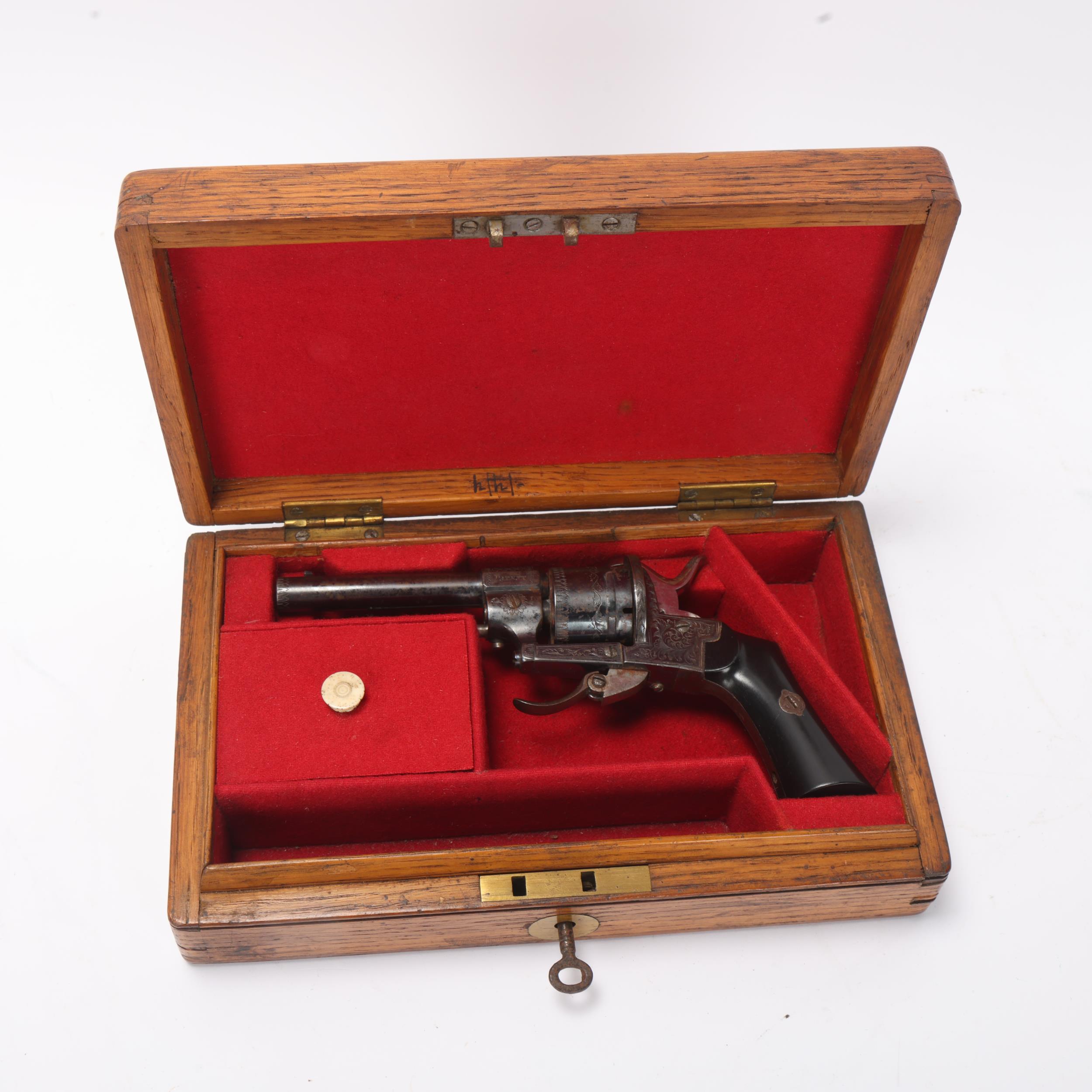 A 19th century pinfire revolver, by D Egg of Pall Mall London, serial no. 7617, barrel length 8.5cm, - Image 3 of 3