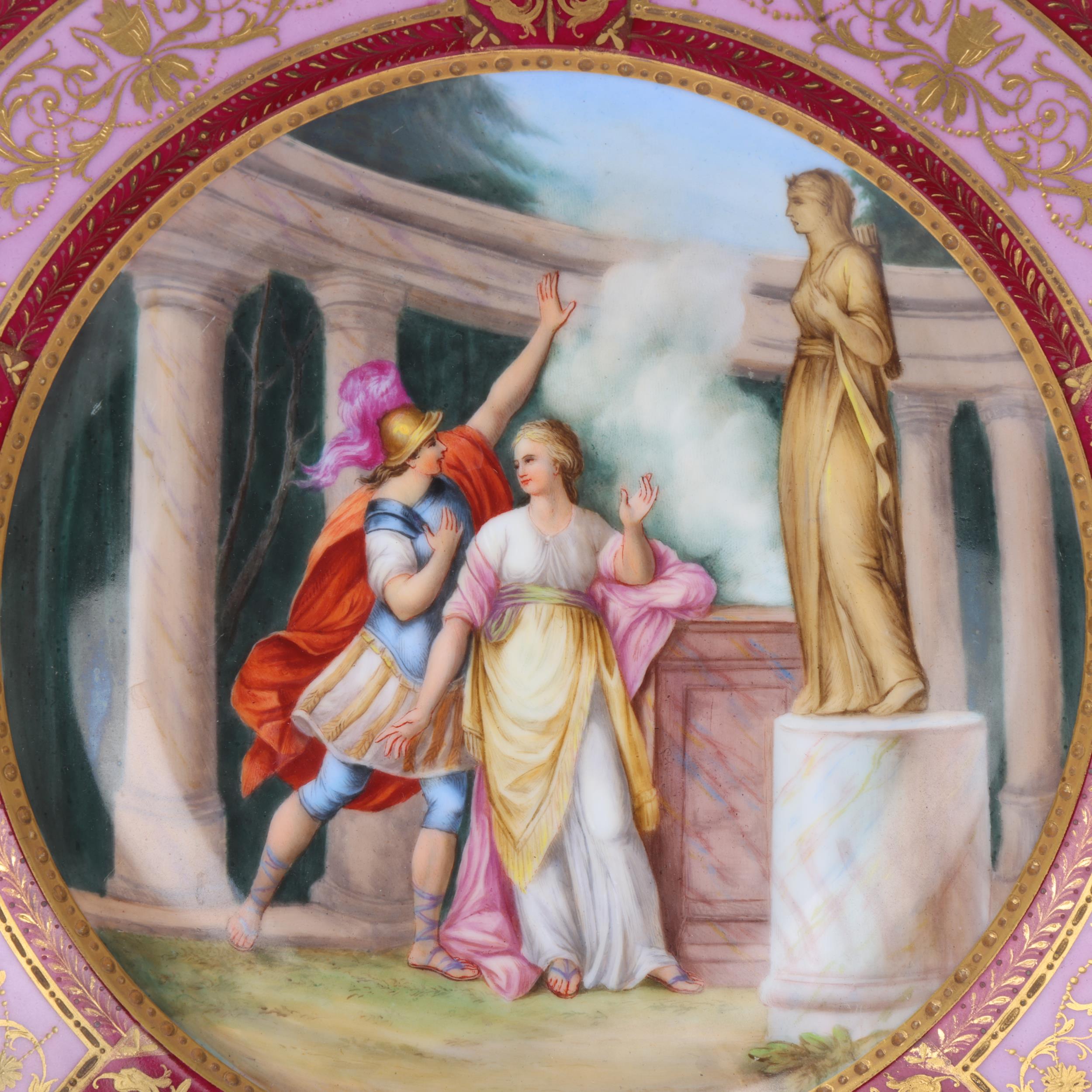 A Vienna porcelain plate depicting Medea in the Temple, gilded border, diameter 23.5cm Good - Image 2 of 3