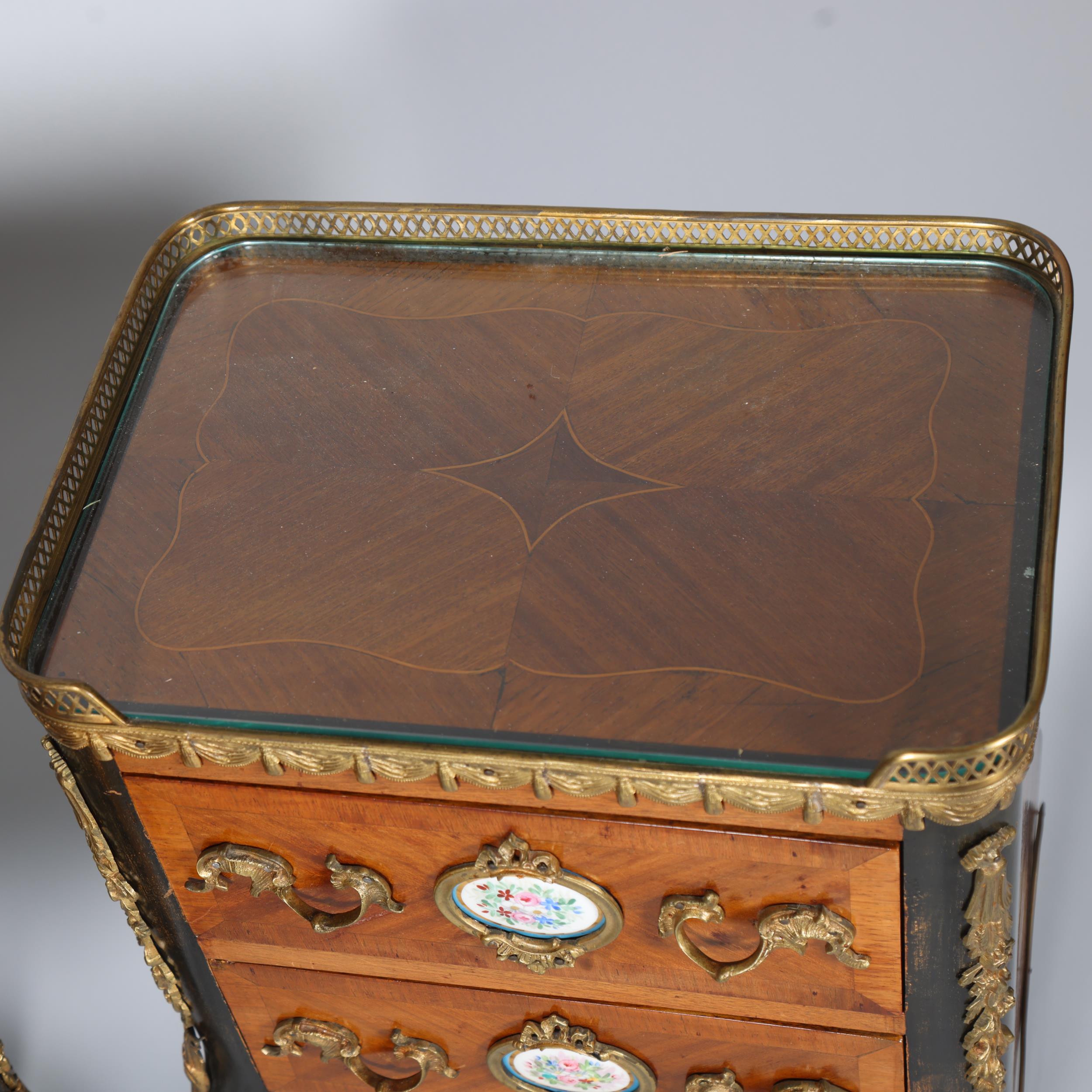 A pair of French walnut 2-drawer bedside chests, inset porcelain plaques to the drawer fronts, brass - Image 3 of 7