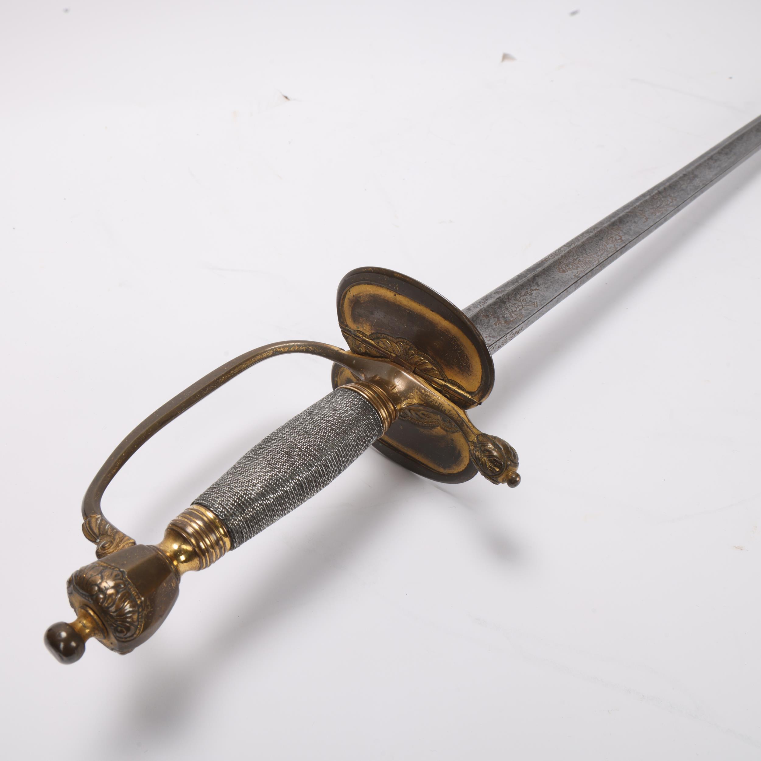 A Georgian sword with silver-bound gilt-brass hilt, folding guard and engraved blade with GR cipher, - Image 3 of 3