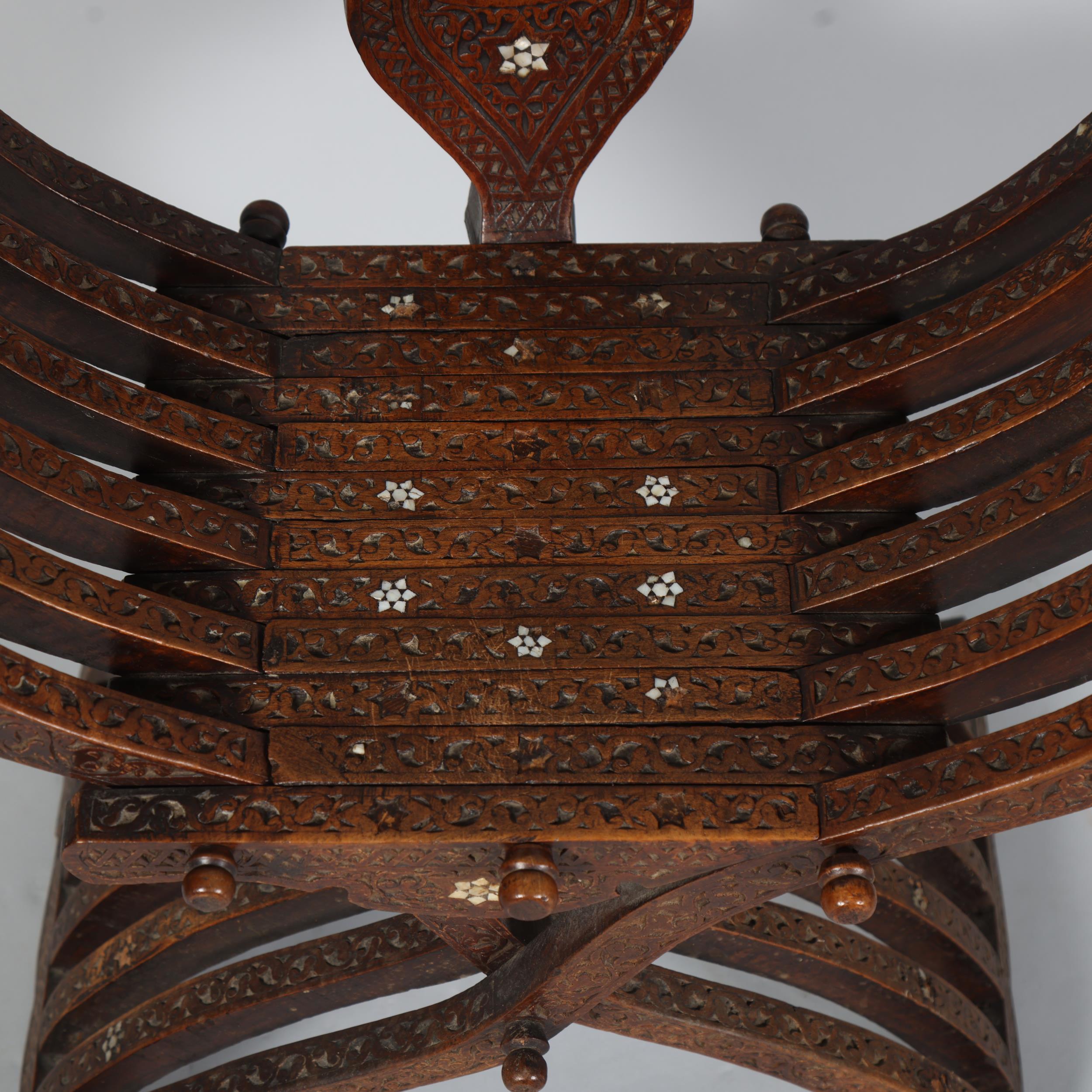 A Damascus X-framed Throne chair, Syria, late 19th century, with carved text to the top rail and - Image 3 of 4