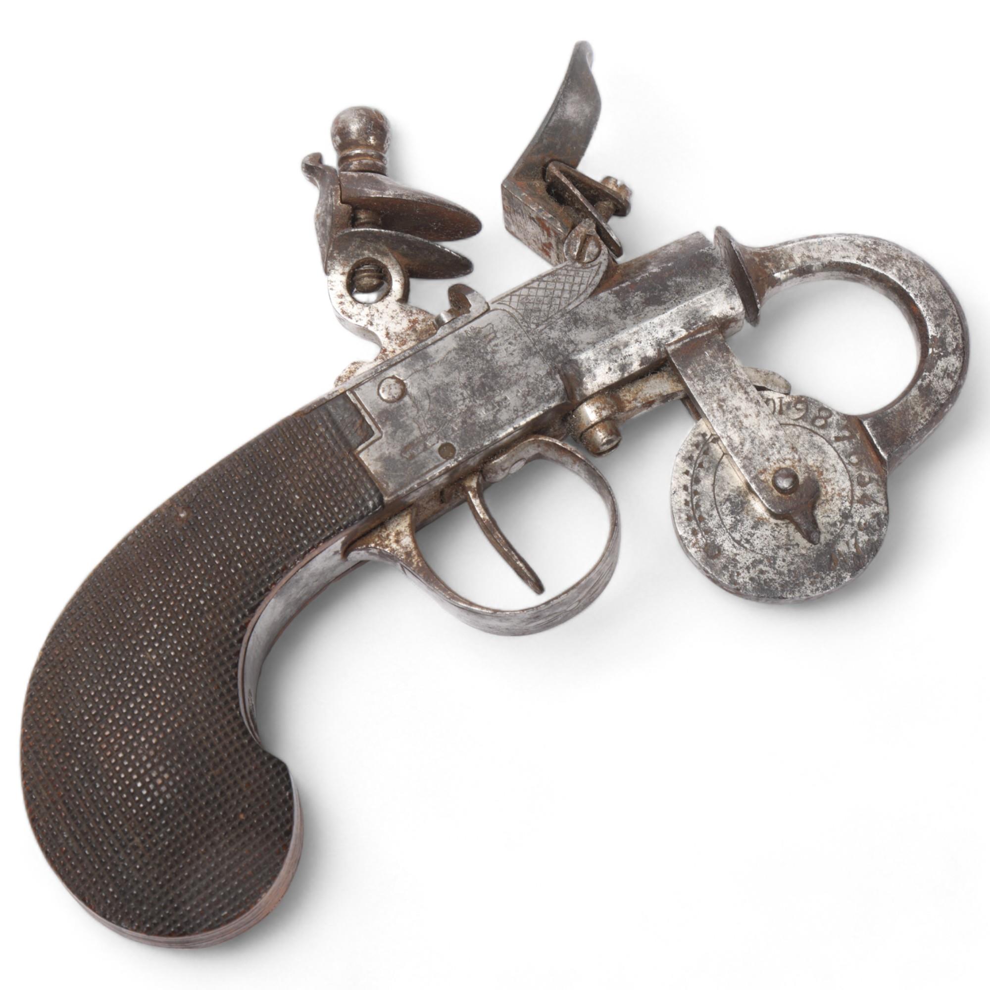 An Antique flintlock powder tester, the lock panels engraved with animals and carved wood handle,