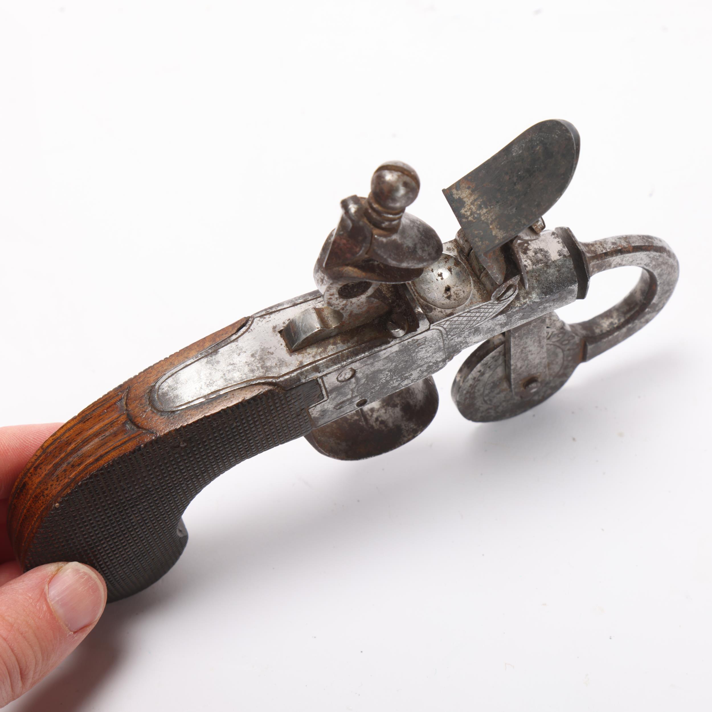 An Antique flintlock powder tester, the lock panels engraved with animals and carved wood handle, - Image 3 of 3