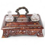 A Victorian tortoiseshell desk stand, with bronze serpent handle, inlaid mother-of-pearl and