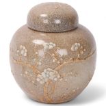 A Chinese crackle glaze porcelain ginger jar and cover, with relief moulded blossom trees, height