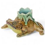 A 19th century Majolica pottery frog design toothpick stand, length 9cm 1 front leg has been