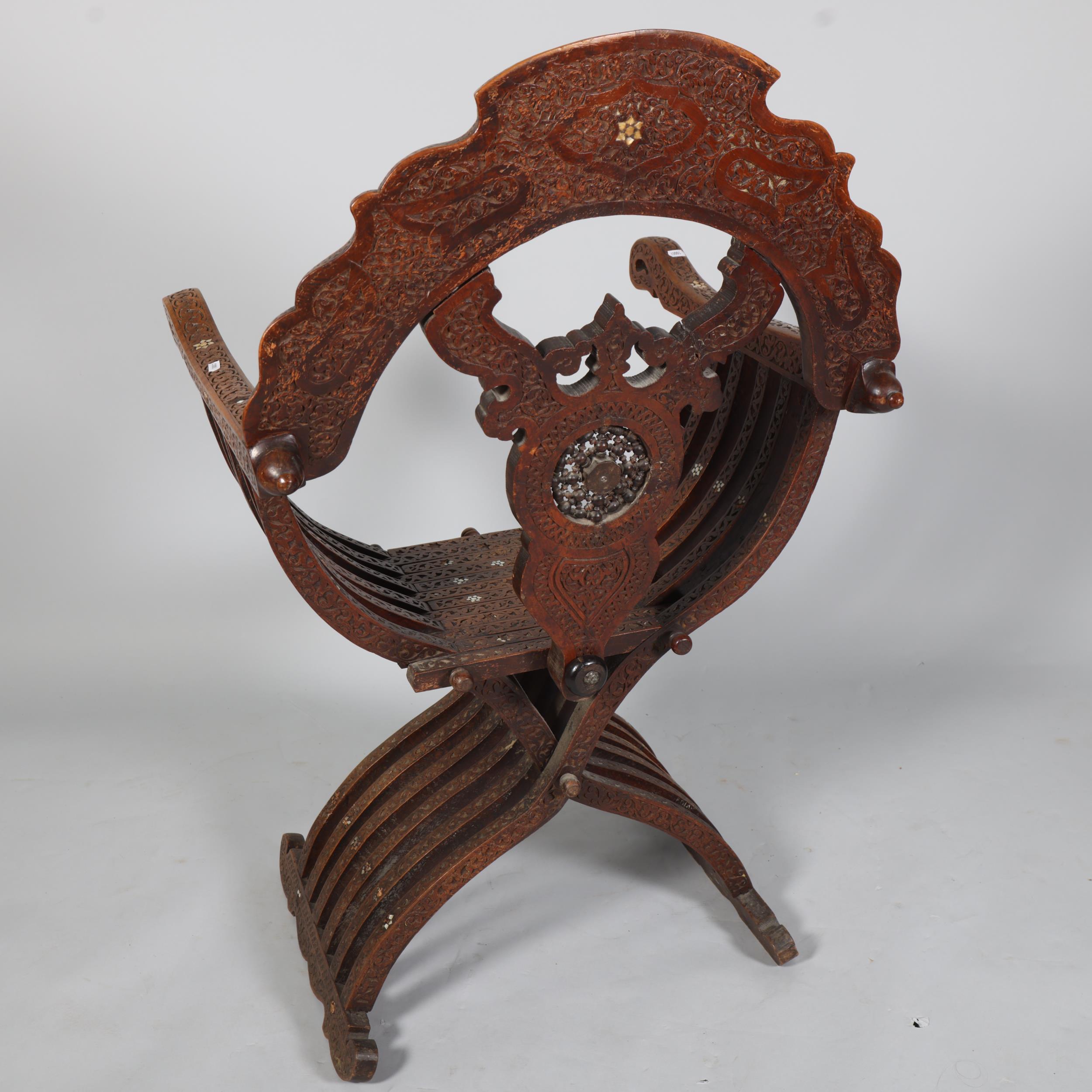 A Damascus X-framed Throne chair, Syria, late 19th century, with carved text to the top rail and - Image 4 of 4