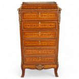 An ornate French mahogany and marquetry inlaid writing cabinet, circa 1900, brass galleried top with