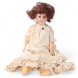 A bisque porcelain-headed girl doll, by Simon & Halbig, with dimple chin, length 46cm