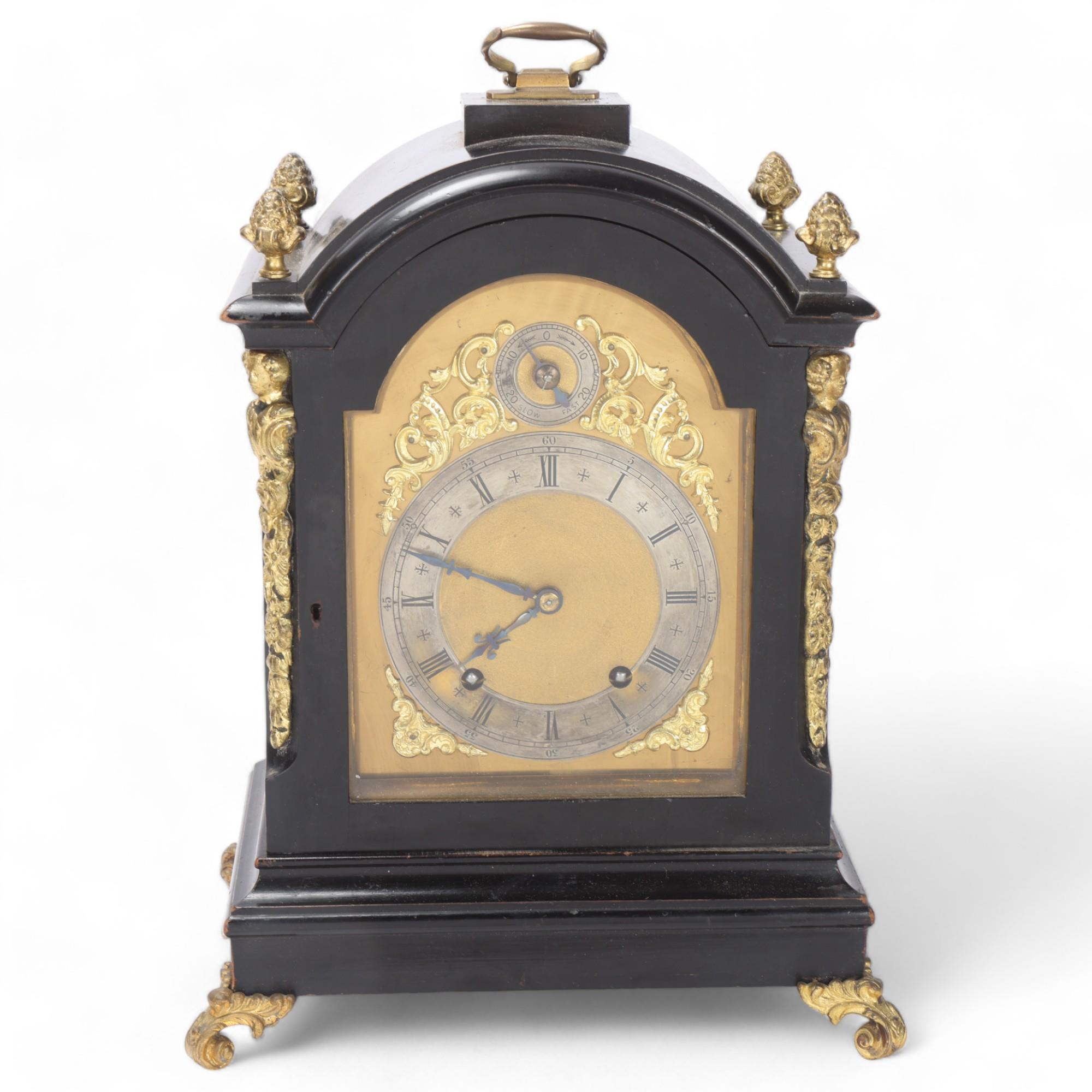 A Victorian ebonised dome-top bracket clock in Georgian style, with gilt-bronze mounts, 8-day