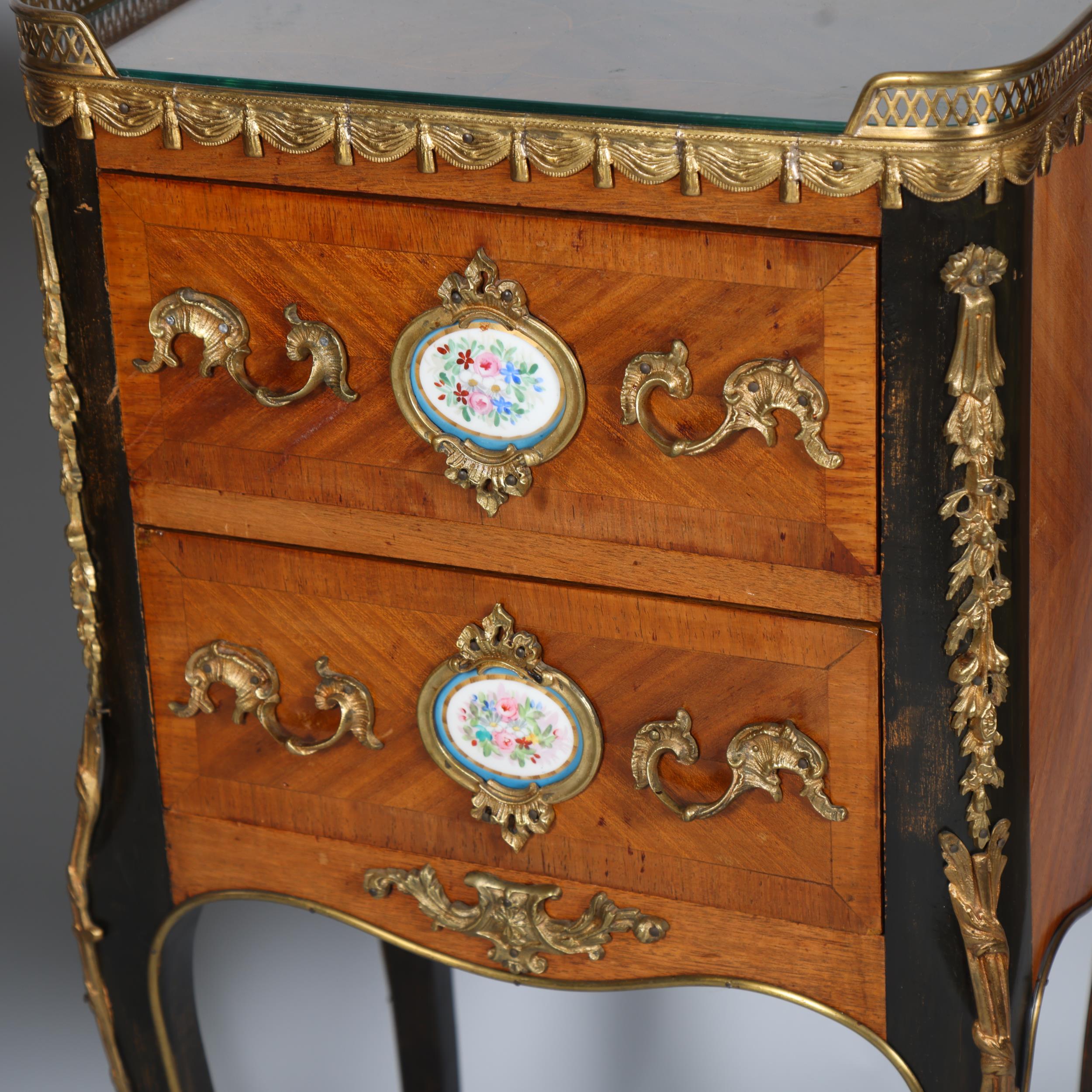A pair of French walnut 2-drawer bedside chests, inset porcelain plaques to the drawer fronts, brass - Image 2 of 7